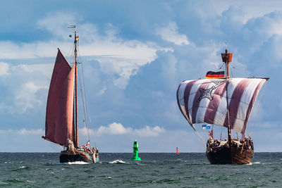 Ship in sea against sky