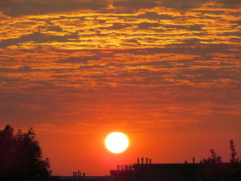 Scenic view of orange sky