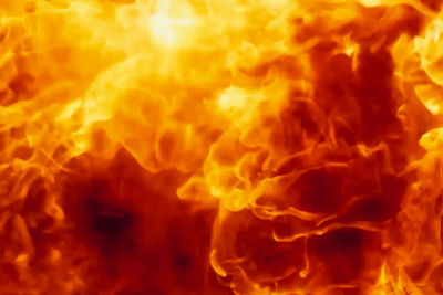 Close-up of fire against black background