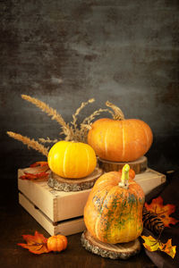 Orange pumpkins on table