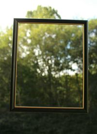 Close-up of window against sky