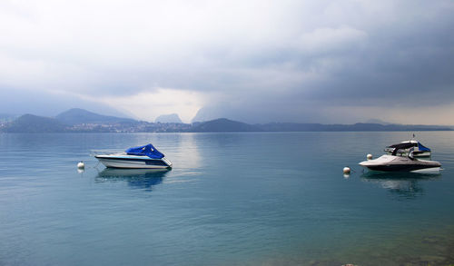 Boat in sea against sky