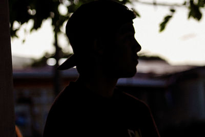 Close-up portrait of young man standing outdoors