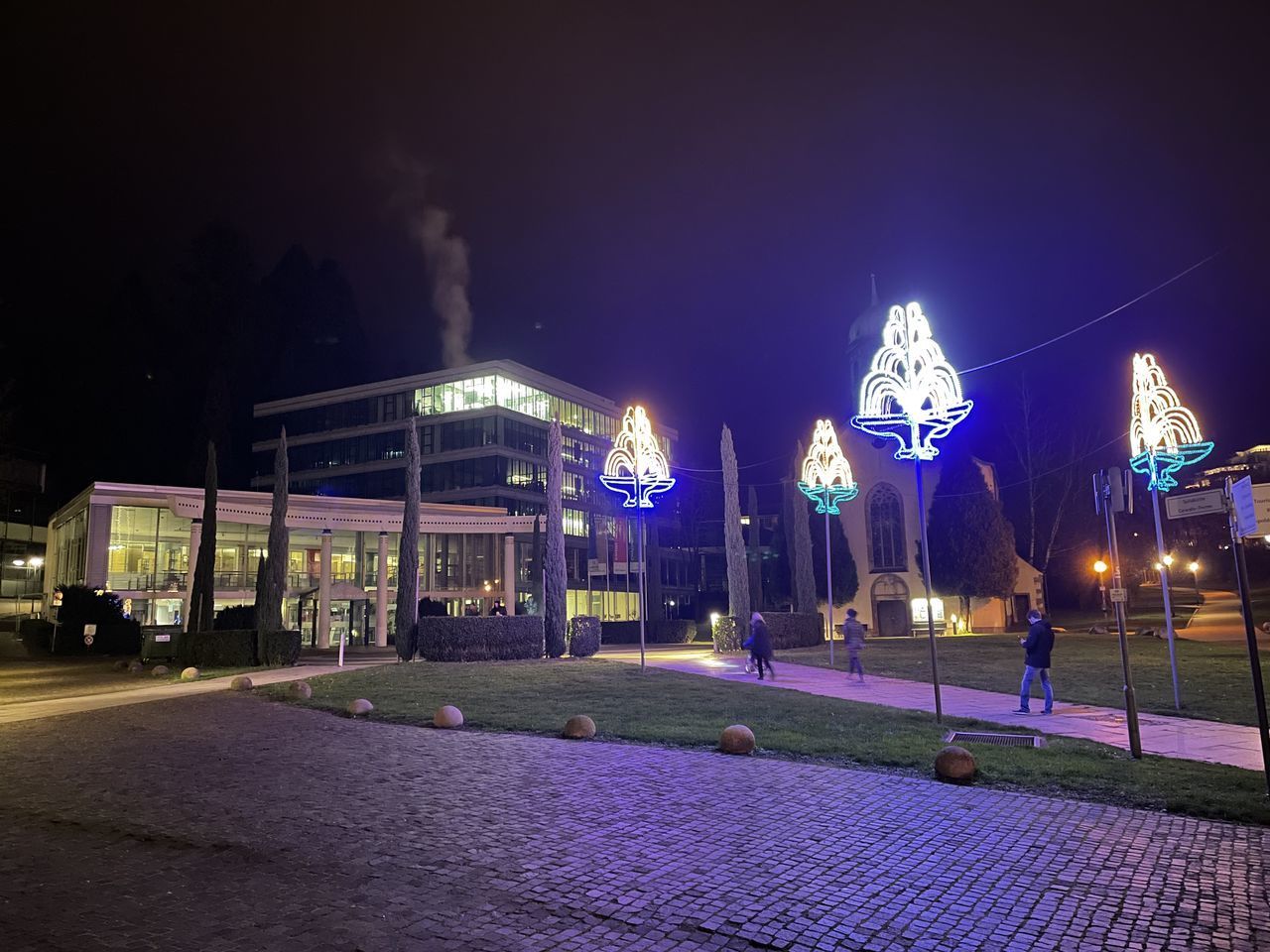 ILLUMINATED BUILDING AT NIGHT