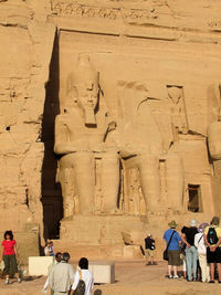 Group of people in front of historical building