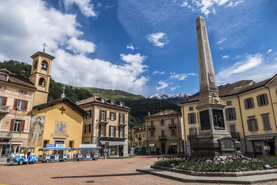 Main square of bellinzona with an obelisk