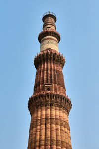 Low angle view of statue against sky