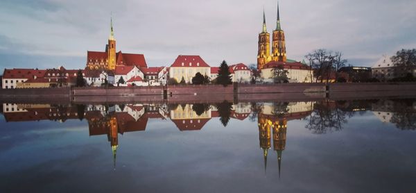 Reflection of buildings in lake