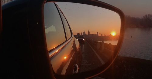 Panoramic view of city against sky during sunset