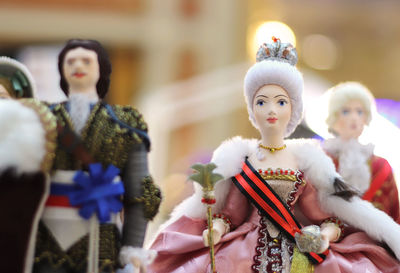 Close-up of dolls for sale