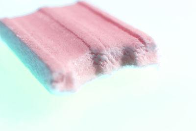 Close-up of ice cream over white background