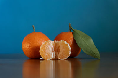 Close-up of orange fruit on table