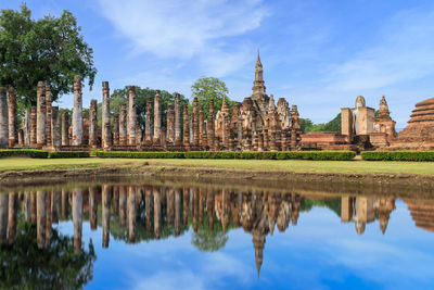 Ancient pagoda and monastery complex at wat mahathat temple, sukhothai historical park, thailand