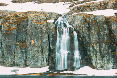 Scenic view of waterfall during winter