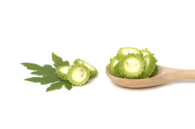 Close-up of fruits against white background