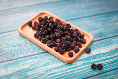 High angle view of fruits on cutting board