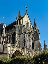 Low angle view of cathedral against clear blue sky