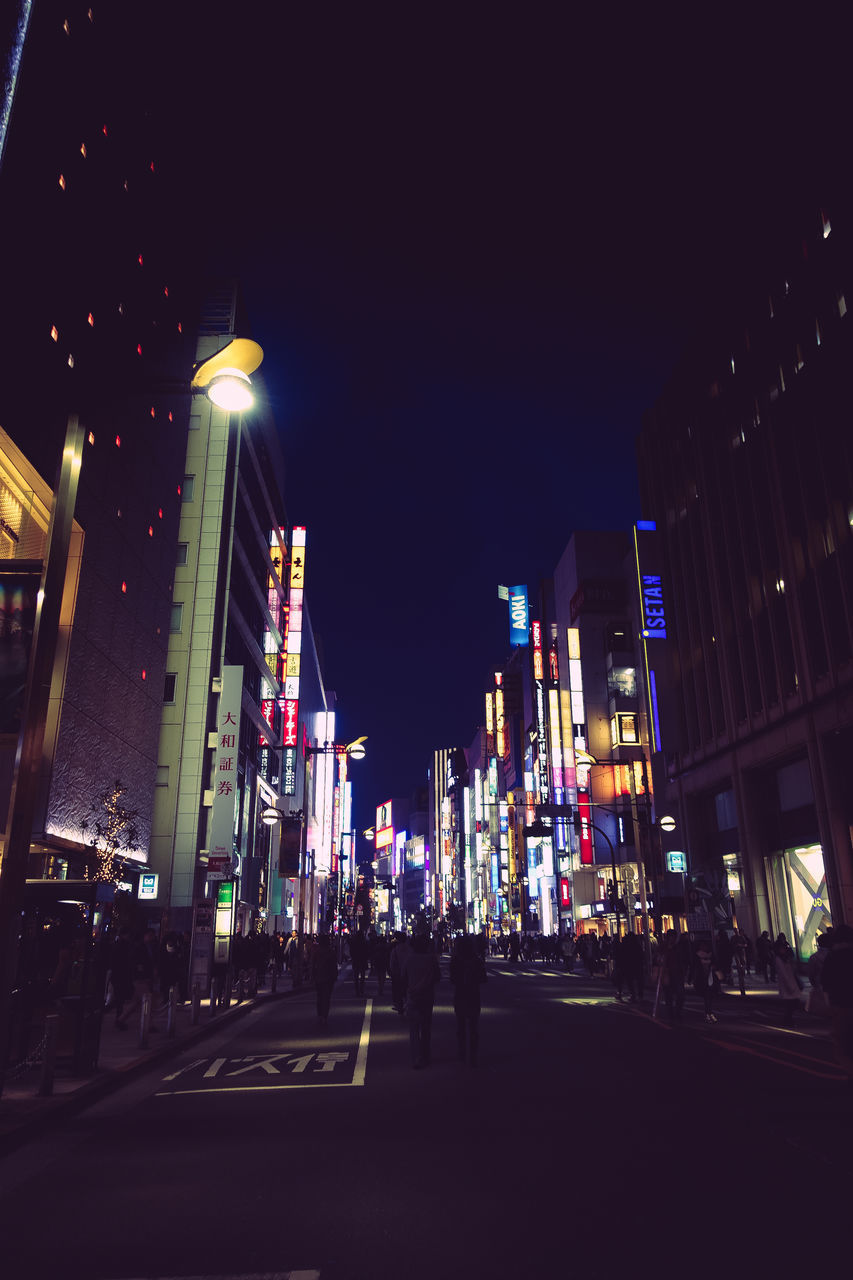 LOW ANGLE VIEW OF ILLUMINATED STREET LIGHTS