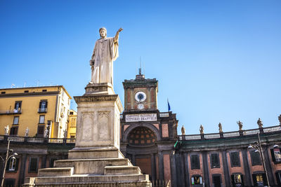 Statue of dante alighieri in piazza dante, naples, italy.