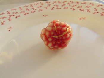 High angle view of strawberries on table