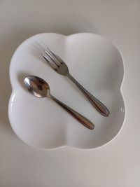 High angle view of fork on table