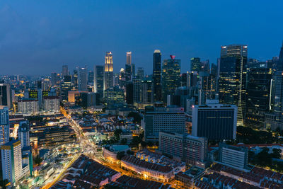 High angle view of illuminated buildings in city against sky