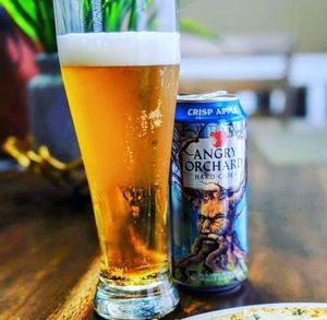 Close-up of beer glass on table