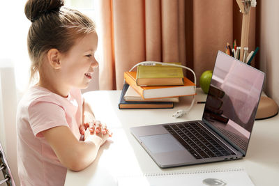 Girl attending online class