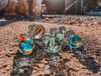 High angle view of multi colored glass on field