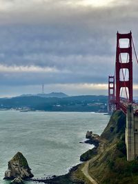 Bridge over sea against sky