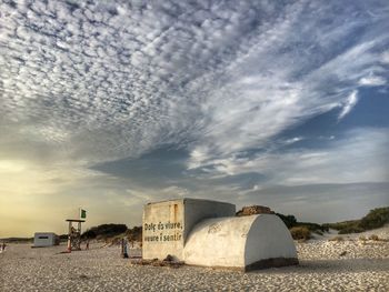 Man on beach against sky