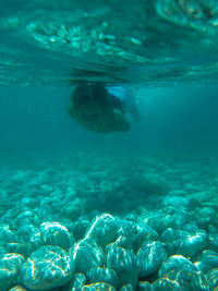 Girl swimming undersea