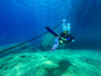 Person swimming in sea