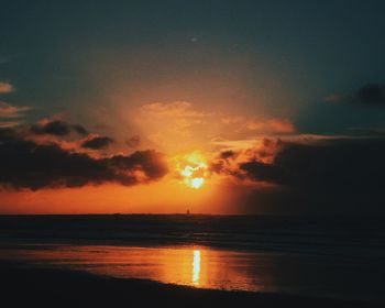 Scenic view of sea at sunset