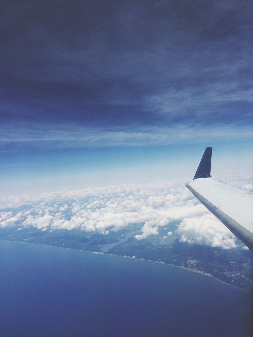 airplane, sky, aircraft wing, scenics, flying, air vehicle, beauty in nature, aerial view, cloud - sky, snow, blue, tranquil scene, nature, part of, winter, tranquility, landscape, cloud, cropped, mountain