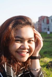 Portrait of a smiling young woman