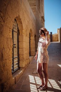 Full length of woman standing outdoors