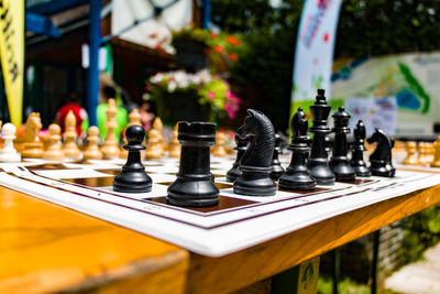 Close-up of chess board on table