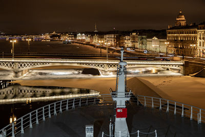 High angle view of bridge over river at night