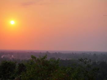 Scenic view of landscape against sky during sunset