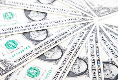 Close-up of coins on table