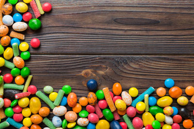 Directly above shot of multi colored candies on table