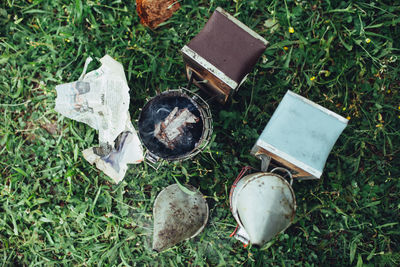 Directly above shot containers on grass