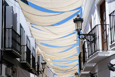 Low angle view of lighting equipment on building