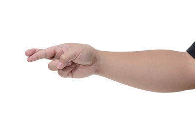 Close-up of hand holding hands against white background