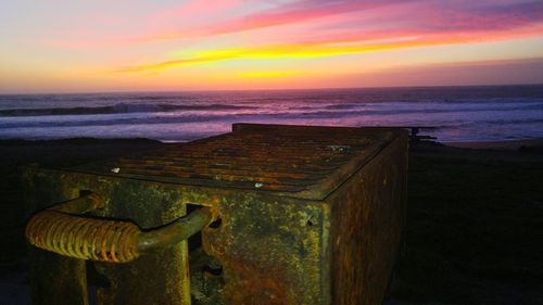 Scenic view of sea at sunset