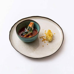 High angle view of food in plate on white background