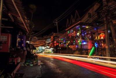 Light trails on city street at night