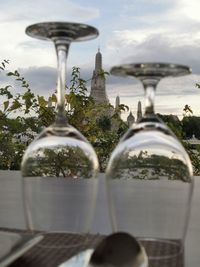 Close-up of glass building against sky