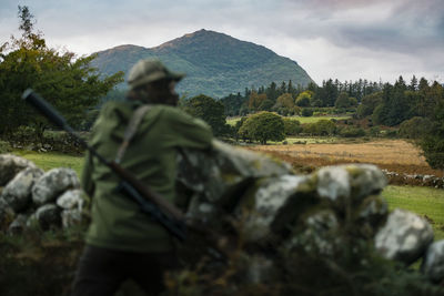 Hunter in mountains